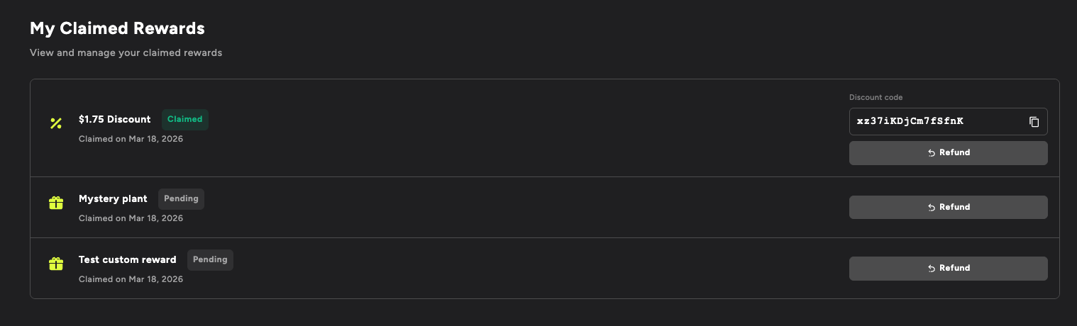 Claims Block listing claimed rewards with status badges, discount codes and Refund buttons